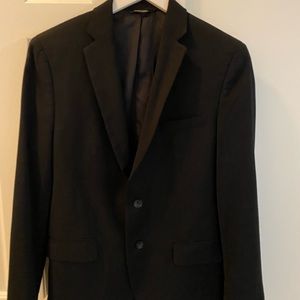 Black suite. Comes with matching pants. 31x32